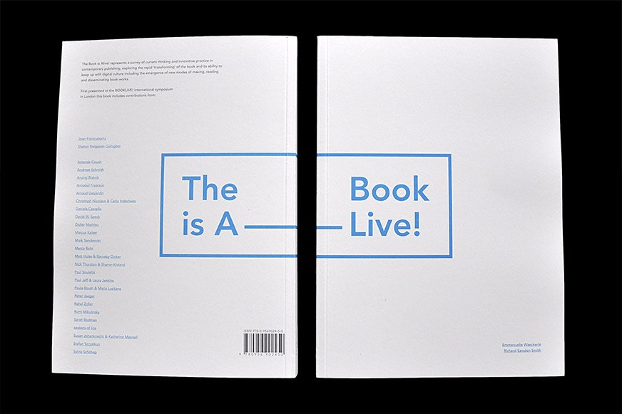 The title is spelled out across the front of one book and the reverse of another