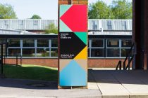 Exhibition entrance graphics panel with solid colours
