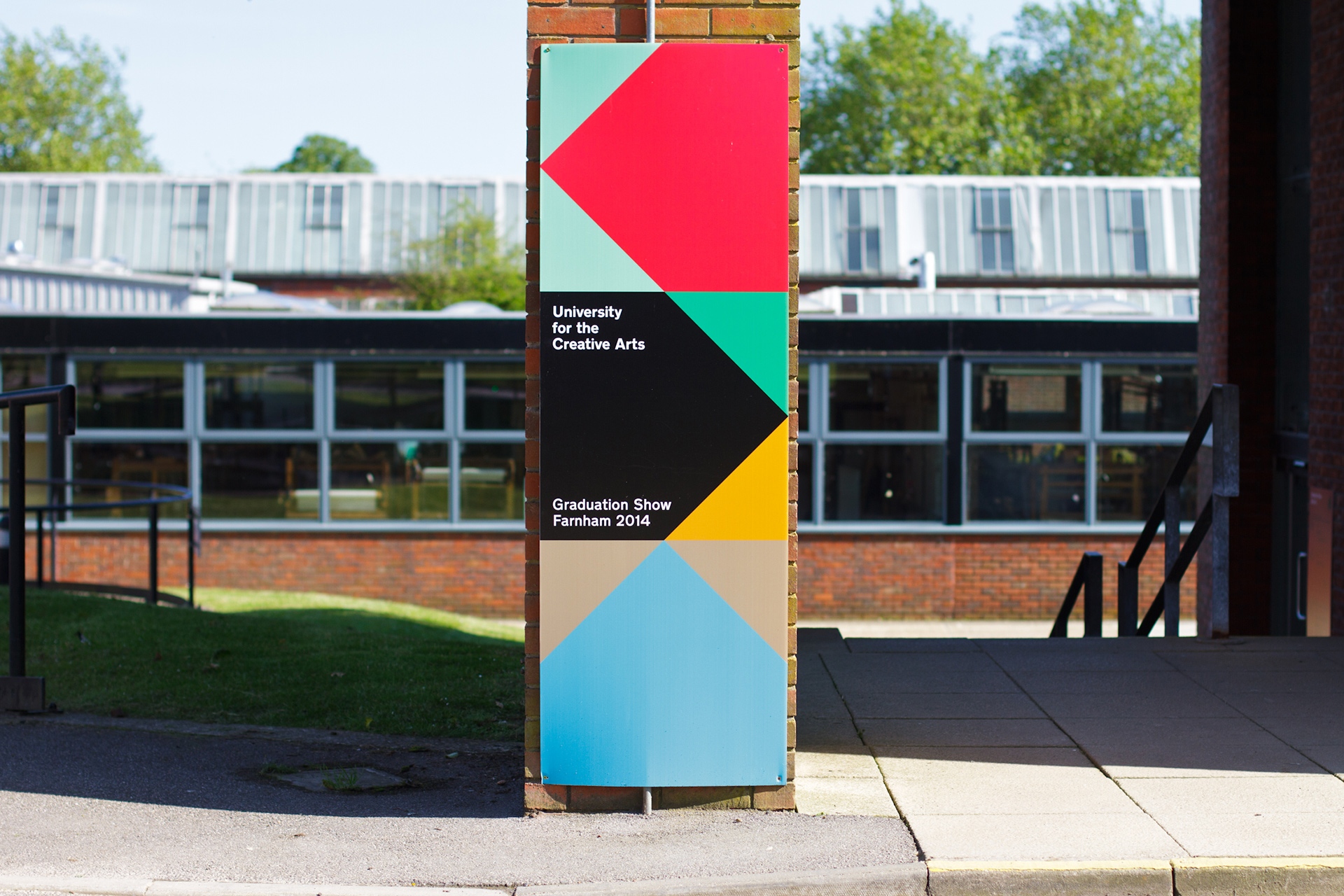 Exhibition entrance graphics panel with solid colours