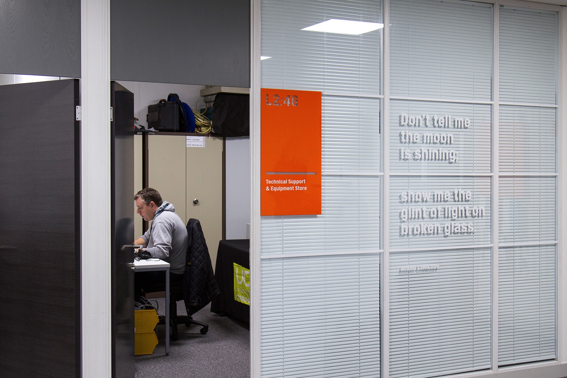 White window graphics with quotes from the film industry