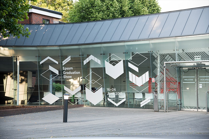 Window graphics at the UCA Epsom graduation show.